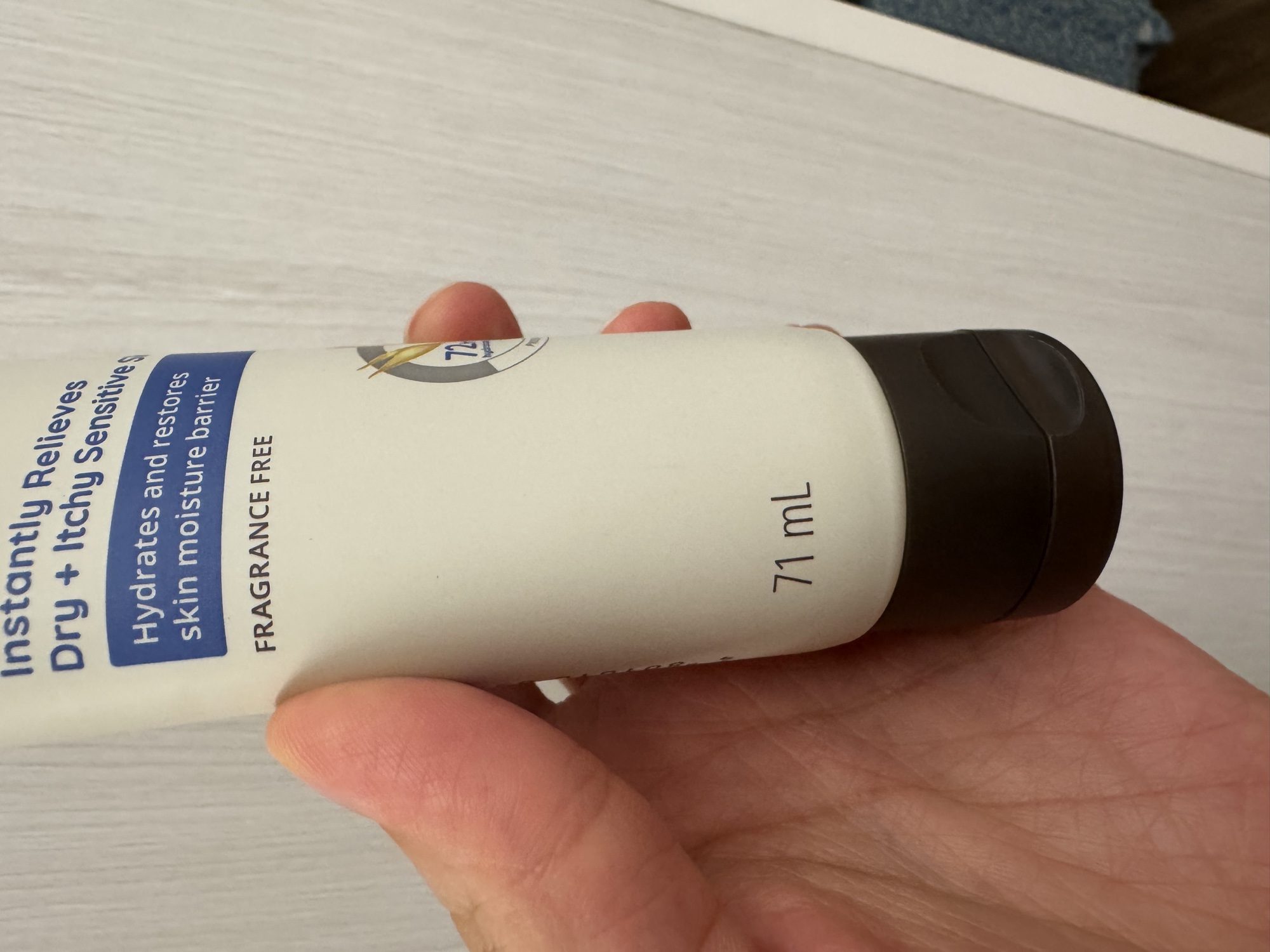 管身正面下段：71 mL 與深色管蓋。