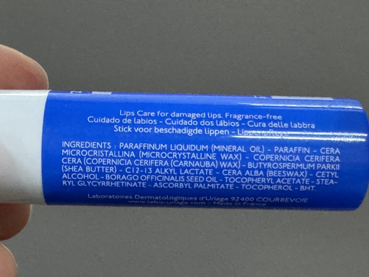 管身成分面。英文 INGREDIENTS 全成分，以及「Lips Care for damaged lips. Fragrance-free」與 Made in France。
